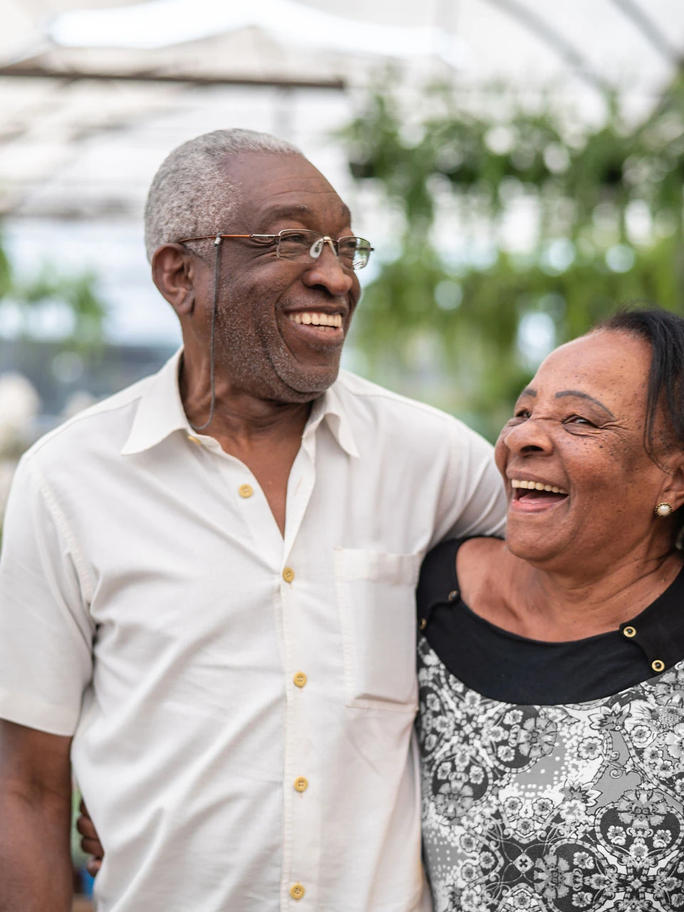 Laughing older couple outdoors